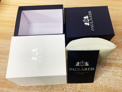 PAULAREIS jewelry box set on a wooden surface