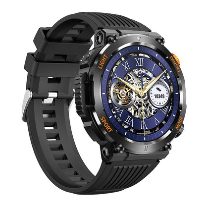 Black sport smartwatch with round blue dial, gold skeleton hands, textured rubber strap