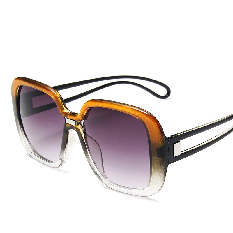 Sunglasses with a gradient purple lens on a white background