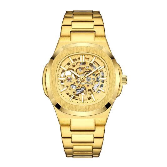 Gold wristwatch with a detailed mechanical face on a white background