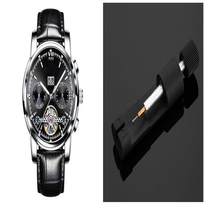 Black wristwatch with detailed face and black leather strap, alongside a close-up of a watch battery.
