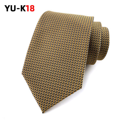 Gold patterned tie on a white background with 'YU-K18' branding.