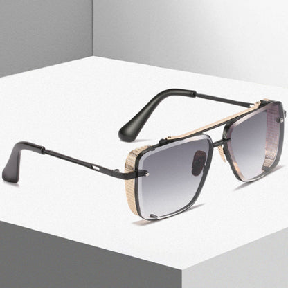 Sunglasses with black frame and gradient lenses on a white platform