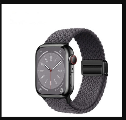 Smartwatch with a space gray braided band on a white background
