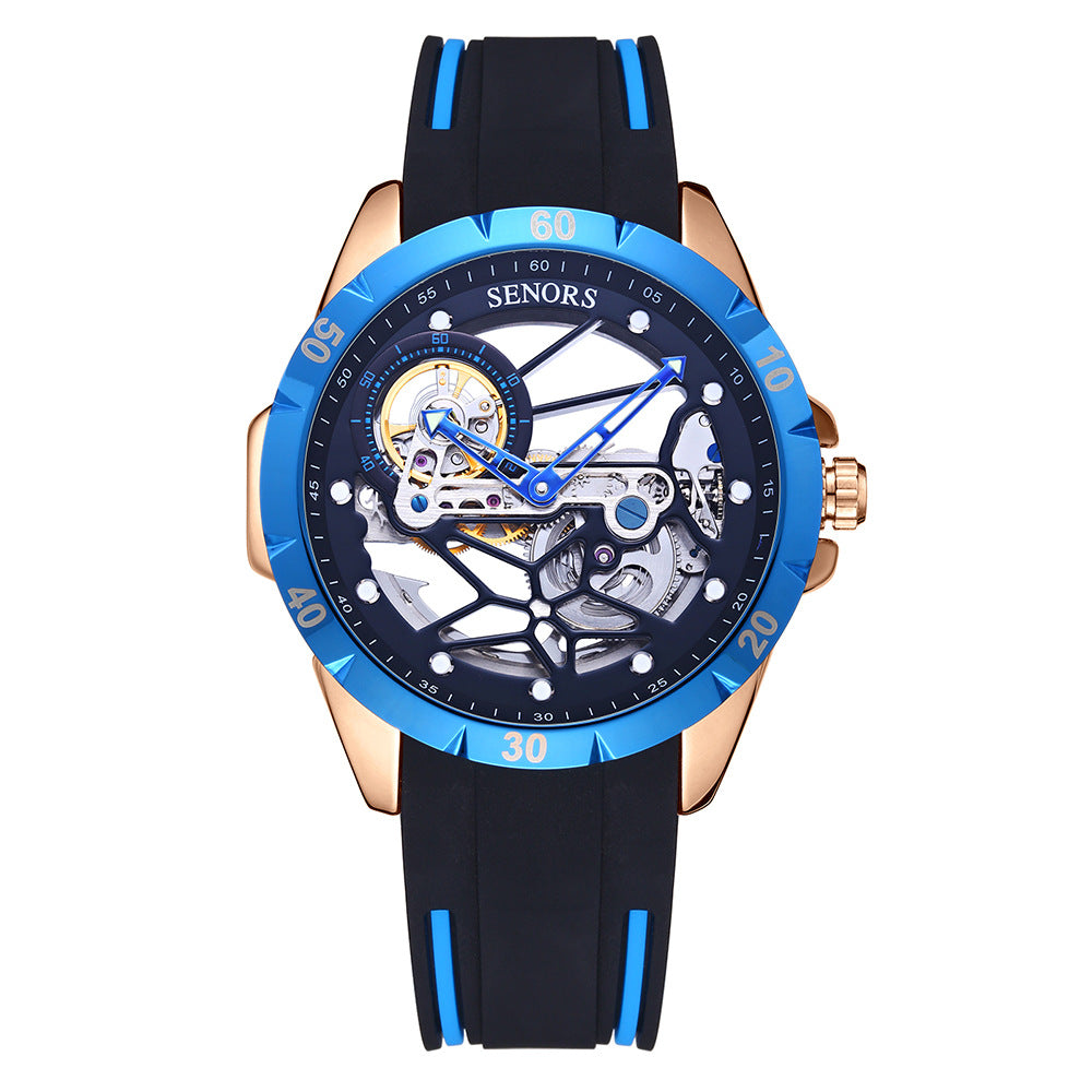 Rose-gold skeleton men's watch with blue bezel, black silicone strap; skeleton dial and hands