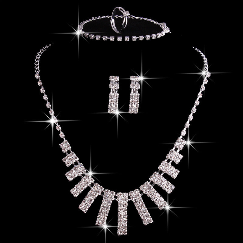 Rhinestone necklace and earrings set with matching bracelet, silver-tone chain