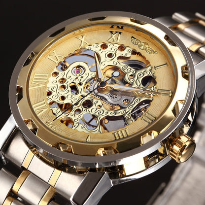 Gold and silver watch with intricate mechanical design on a dark background