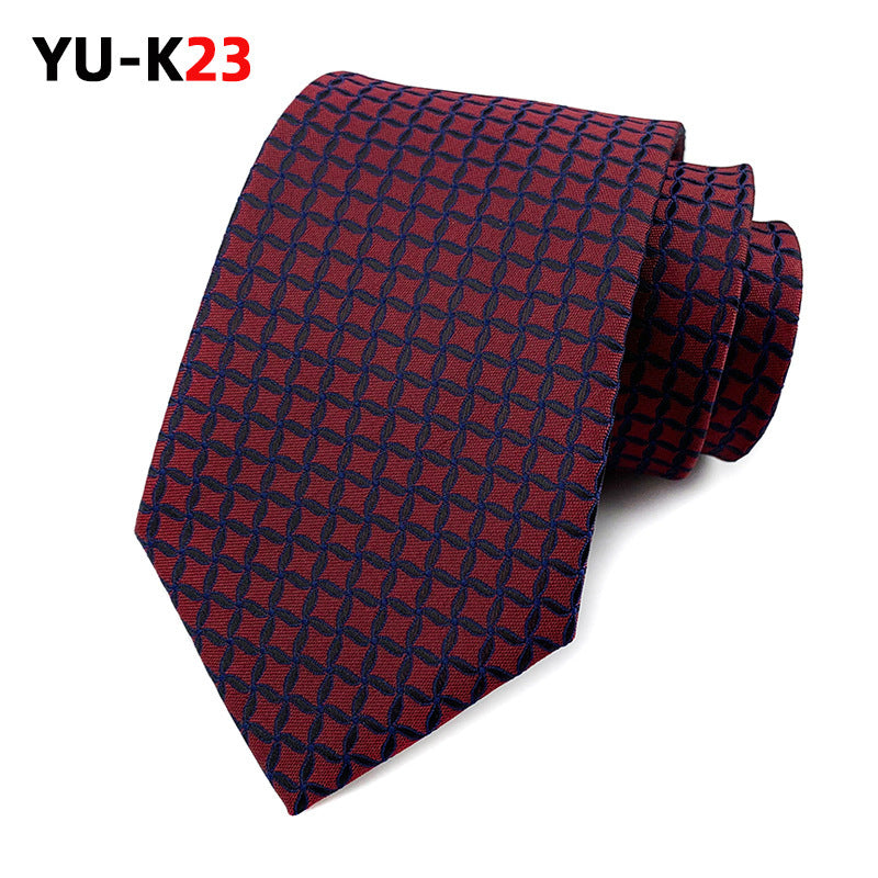 Red and blue patterned tie on a white background with 'YU-K23' branding.