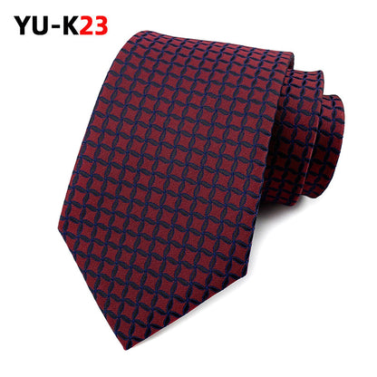 Red and blue patterned tie on a white background with 'YU-K23' branding.