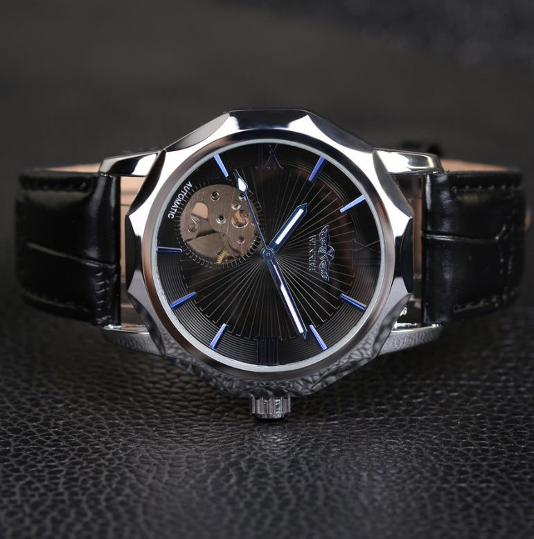 Men's automatic mechanical watch with dark dial, blue accents, and black leather strap, 42mm