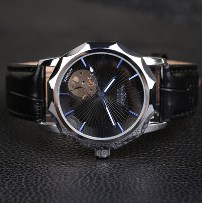 Men's automatic mechanical watch with dark dial, blue accents, and black leather strap, 42mm