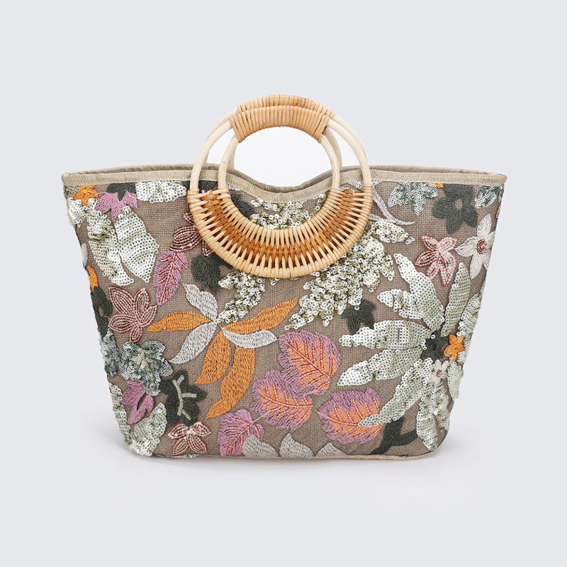 Large woven cotton tote bag with multicolor sequined leaf-floral pattern and rattan handle