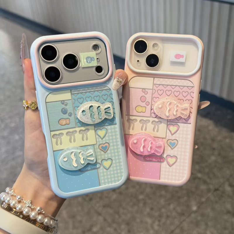 Color-block iPhone case set: pale blue and pink with hearts and raised 3D fish