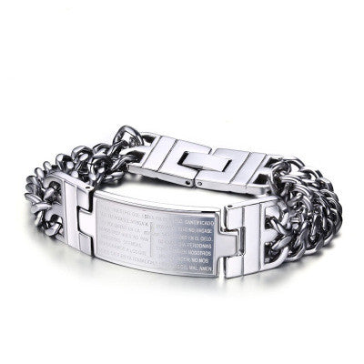 Silver chain bracelet with a rectangular tag on a white background