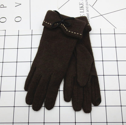 Brown gloves on a white grid background