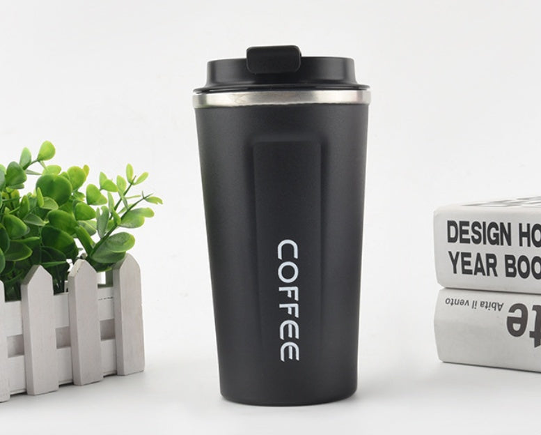 Black coffee tumbler with 'COFFEE' text on a white background