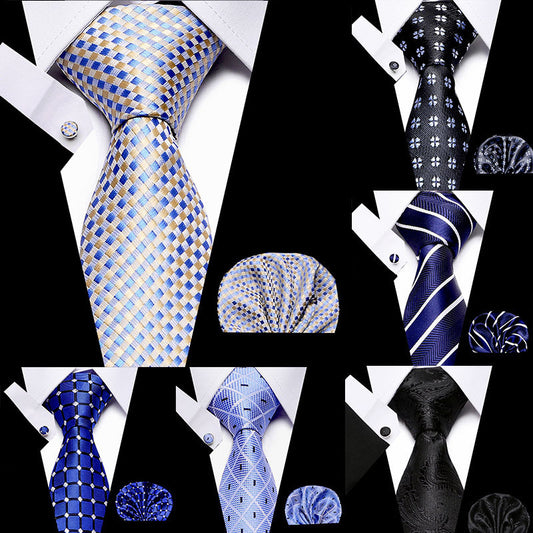 Collection of various neckties and pocket squares on a black background