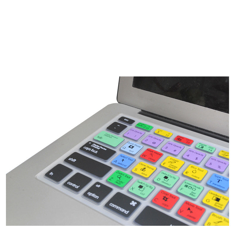 Colorful keyboard cover on a laptop with a white background. YAXSO UAE ONLINE STORE