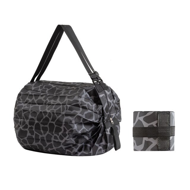 Gray patterned bag and matching wrap on a white background