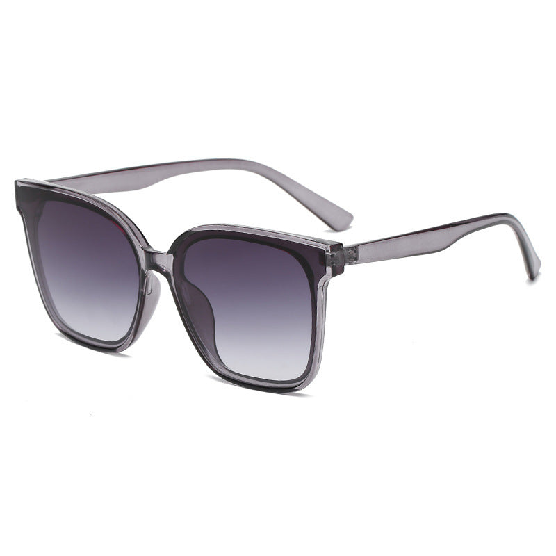 Sunglasses with gradient lenses on a white background