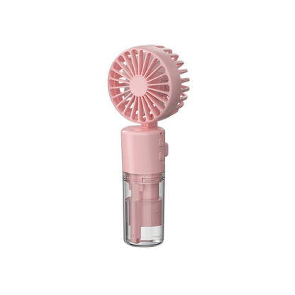 Pink spray fan with round grille and clear mist chamber