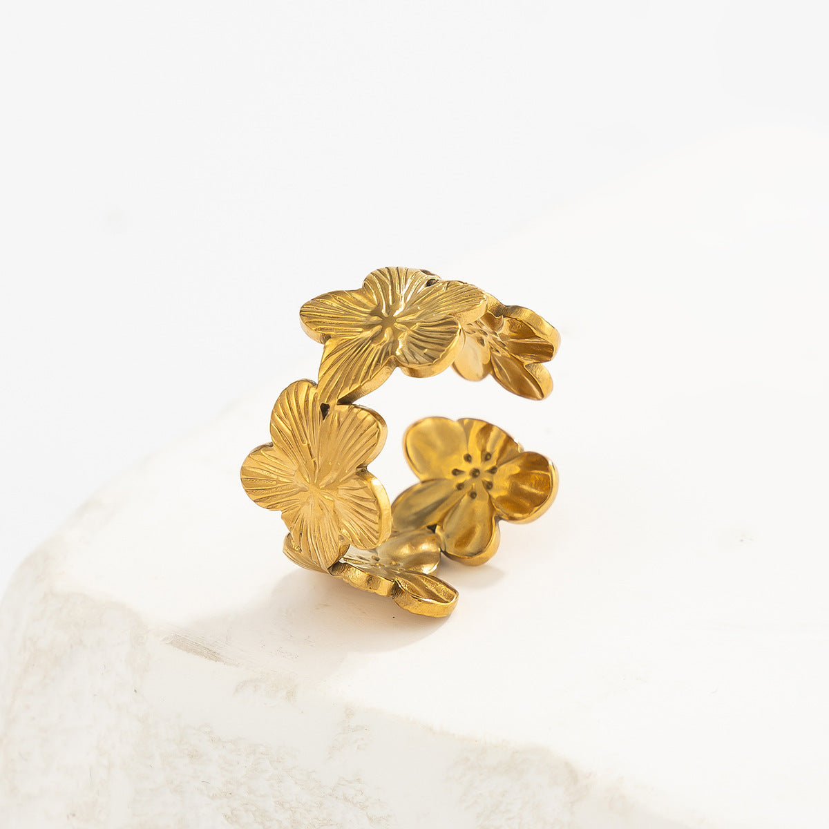 18K vacuum-plated gold floral cluster ring with three layered blossoms