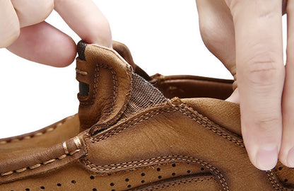 Close-up of a brown leather shoe with stitching detail