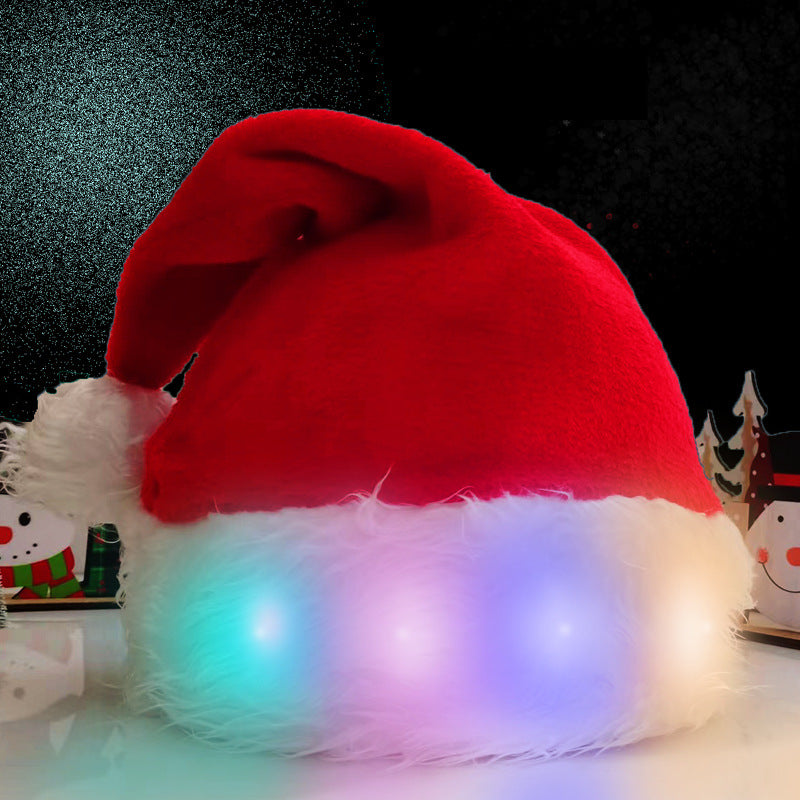 Red plush Santa hat with white brim and glowing multi-color LED lights