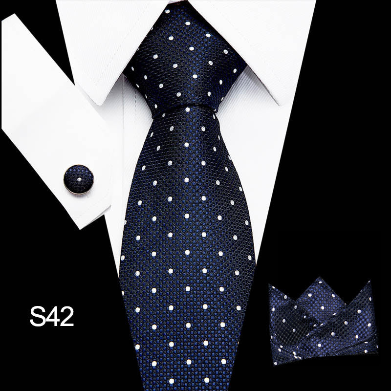 Men's business tie in dark navy with small light-blue dot pattern