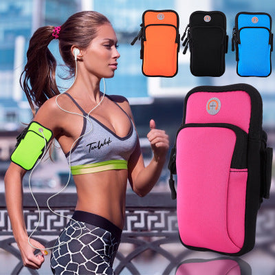 Pink sports phone pouch with black trim and zippered front pocket
