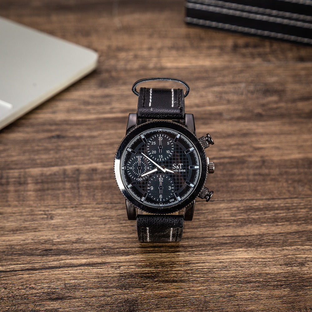 Men's black leather strap wristwatch with chronograph-style dial and metal case.