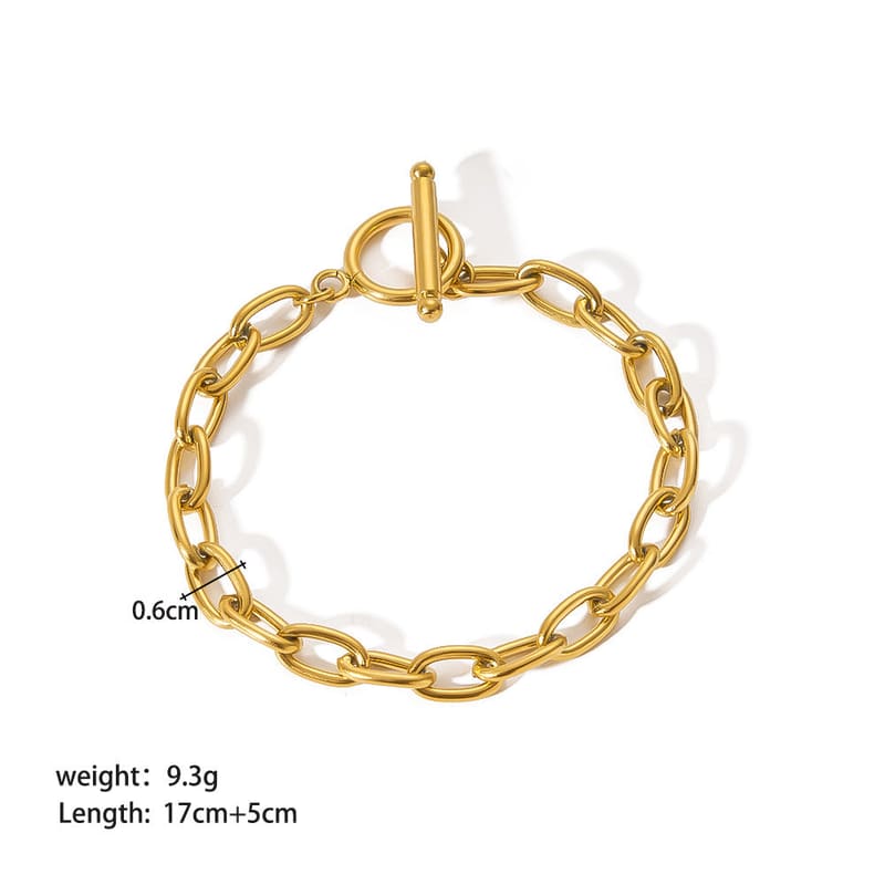 Gold-tone oval link bracelet with toggle clasp and short extension chain