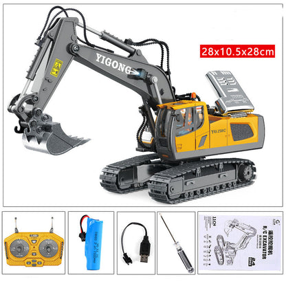 Yellow RC excavator toy with metal arm, bucket attachment, and rubber track base