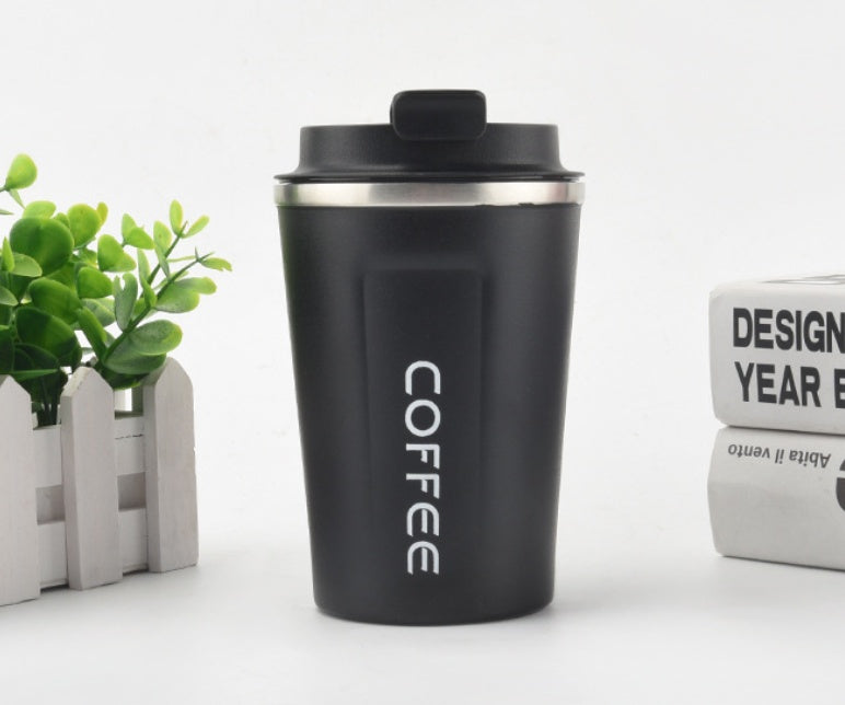 Black coffee tumbler with 'COFFEE' text on a white background