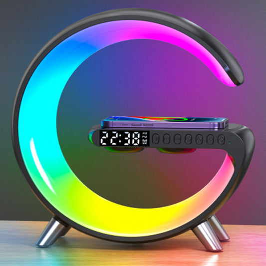 Black G-shaped LED lamp with multicolor lighting, digital clock, speaker controls and phone charging pad