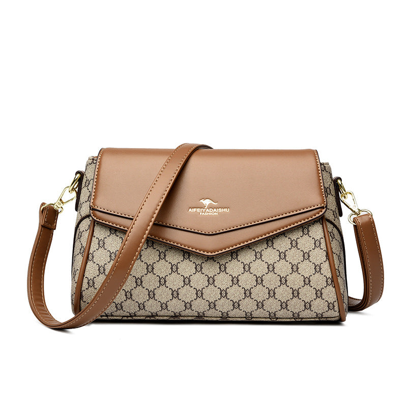 Beige and brown logo crossbody shoulder bag with tan flap, gold-tone hardware, side straps