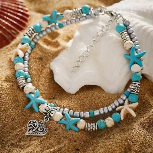 Turquoise and silver beaded anklet with starfish charms and heart clasp pendant