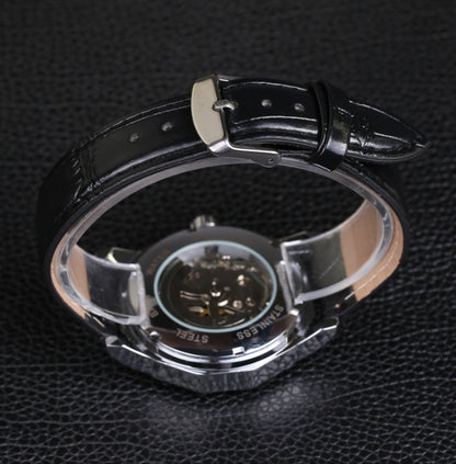 Men's automatic mechanical watch with black leather strap and see-through caseback