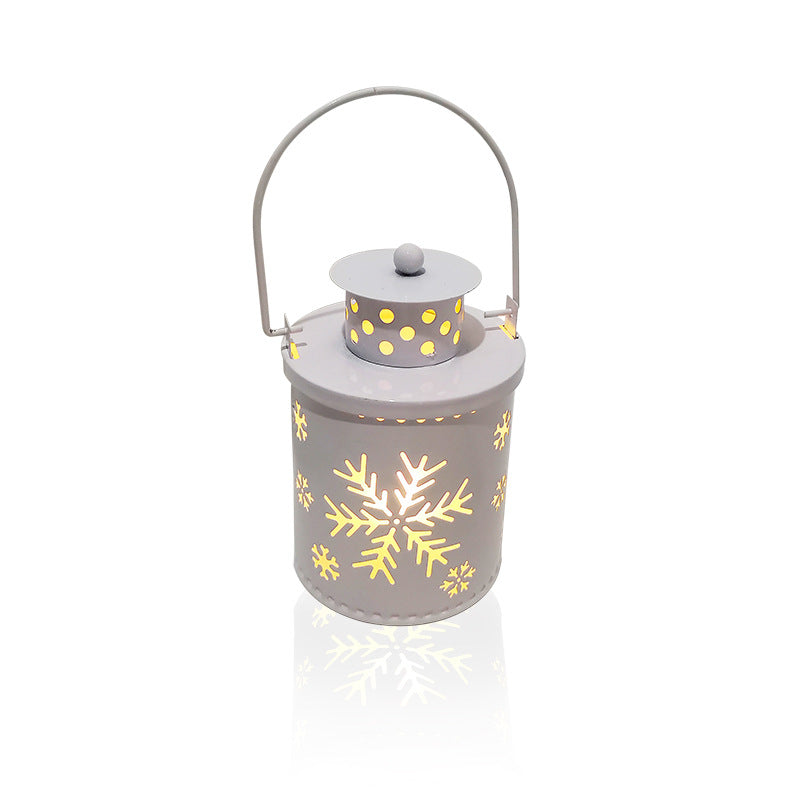 White LED lantern candle with snowflake cutouts, round top handle, warm light