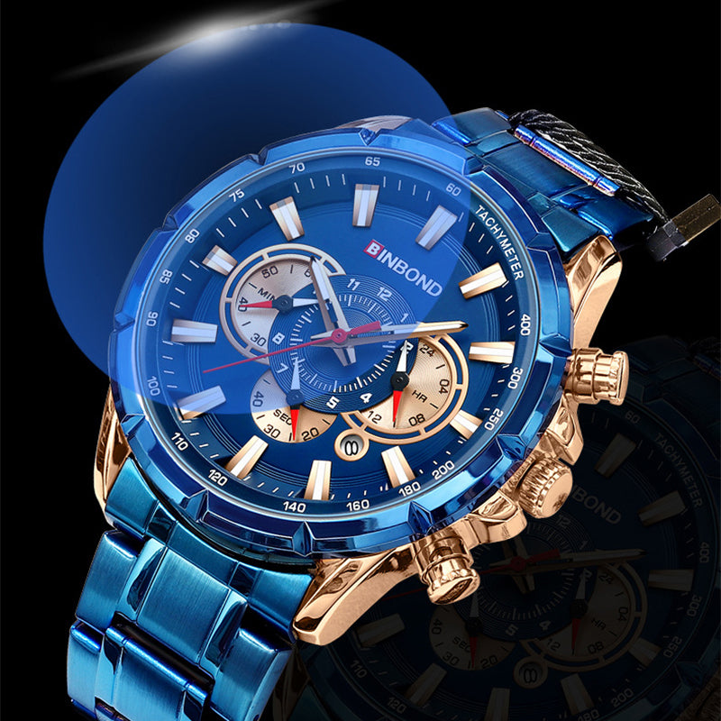 Blue tactical wristwatch with gold bezel, multi-dial face, on dark background
