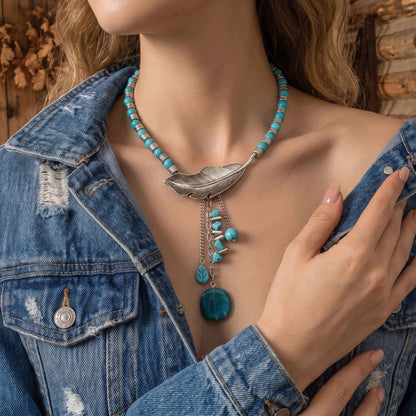 Turquoise beaded choker with alloy leaf-and-feather pendant and round blue center charm