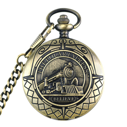 Bronze pocket watch with 'The Polar Express' design on a white background