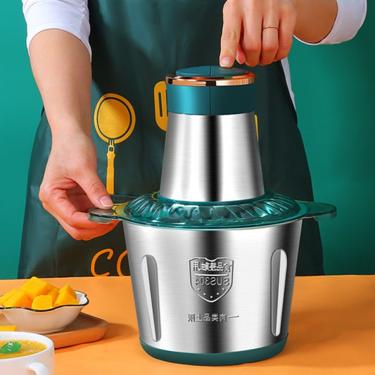 Person using a manual juicer with a green background