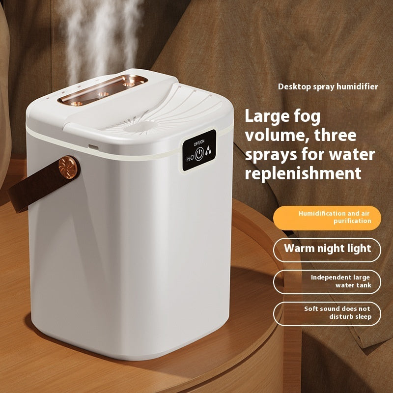 White desktop spray humidifier with large top nozzle and warm night light