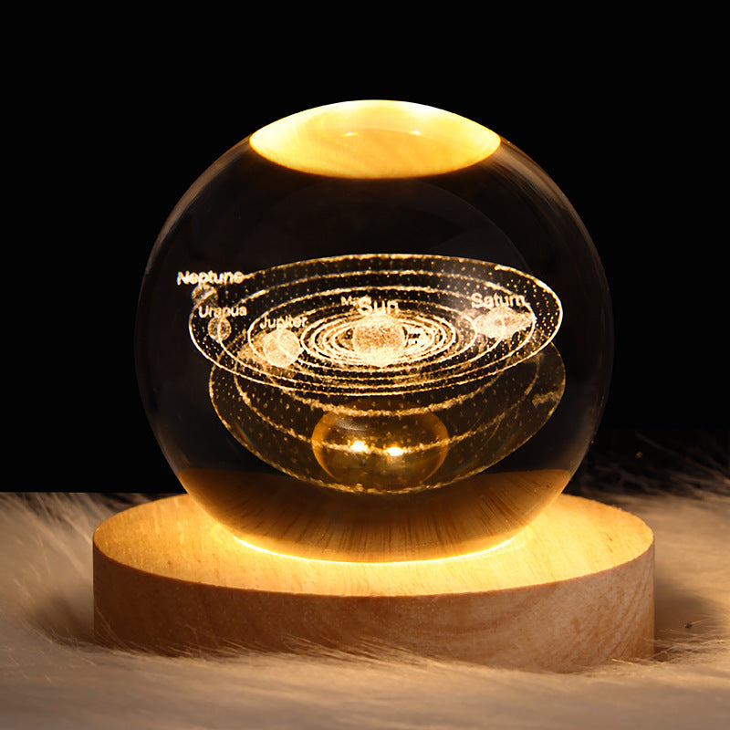 LED crystal ball night lamp with Solar System light rings and planets on wooden base