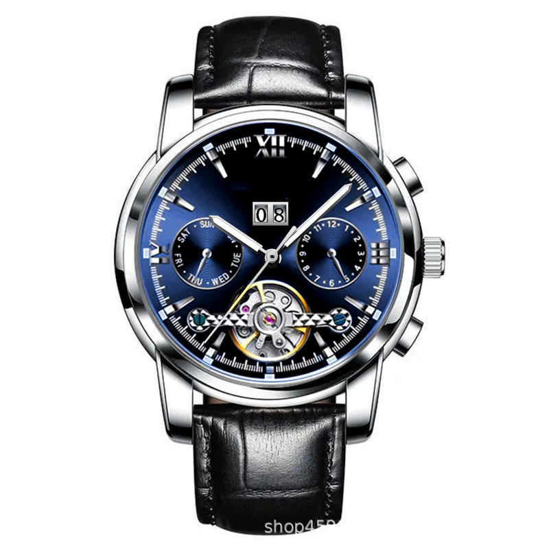 Luxury watch with black leather strap and blue dial on a white background