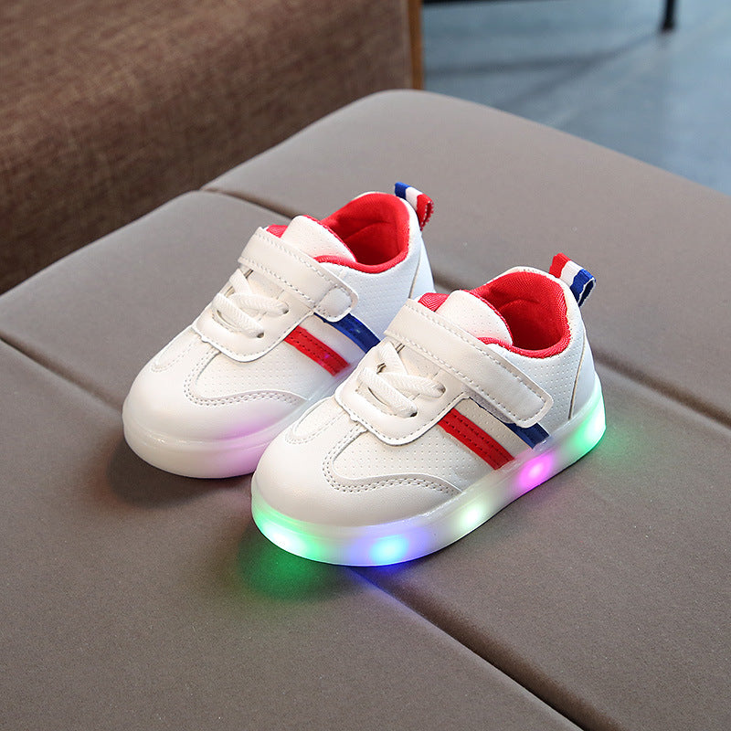 Kids light-up sneakers, white with red side stripes and glowing multicolor LED sole
