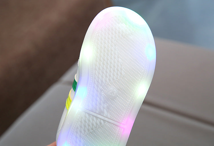 Kids white LED light-up sneaker outsole with bright glowing light strip