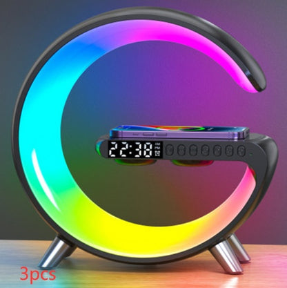 Black G-shaped LED lamp with multicolor lighting, clock display and phone charging pad