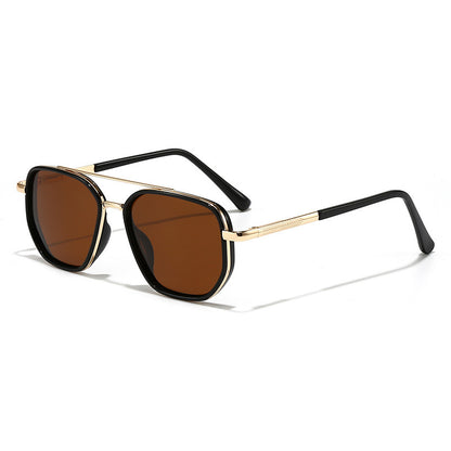 Sunglasses with gold frame and black arms on a white background